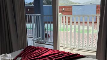 Standard Triple Room, Pool View | Laptop workspace, free WiFi