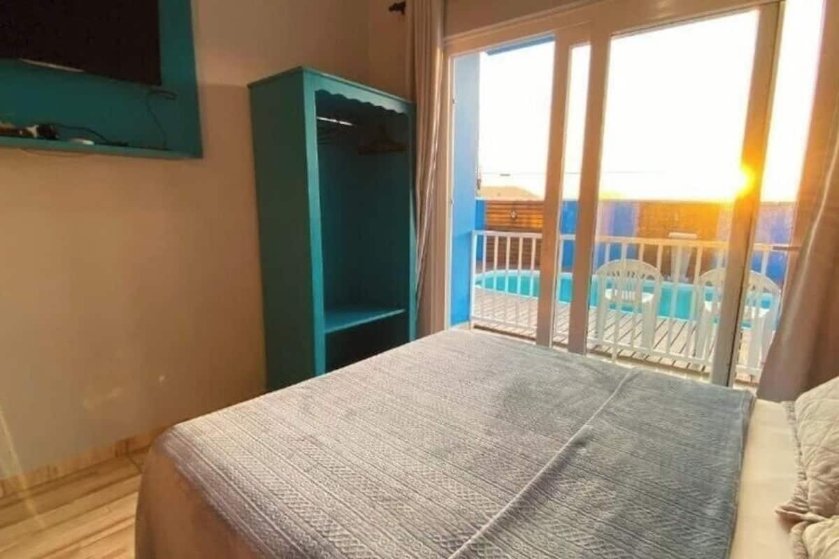 Standard Twin Room, Pool View | Laptop workspace, free WiFi
