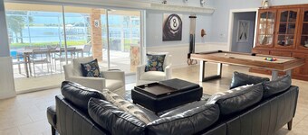 Lake Sirena Retreat, 5 BR Lakefront Oasis w/Pool, Kayaks, Sauna, Paddle Boards