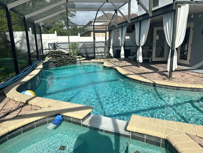 Orlando Family Getaway • 4BR Home w/ Pool & Cinema Lounge
