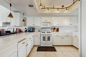 Fridge, microwave, oven, stovetop - Dog-Friendly Updated Condo Next to Golf Courses w/WiFi, AC, W/D, Shared Pool (Palm Desert)