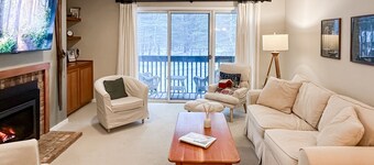 Top floor condo w/ balcony, gas fireplace, tennis, walking/biking trails, w/d