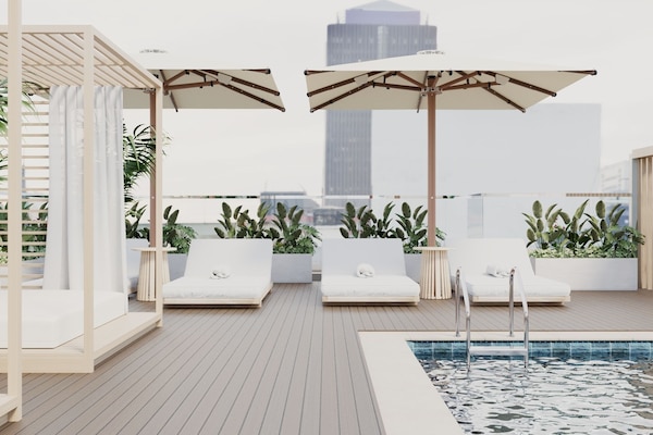 Outdoor pool, pool umbrellas, sun loungers