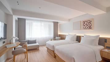 Free minibar, in-room safe, desk, iron/ironing board