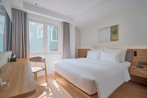 Ropa de cama de alta calidad y minibar con artículos gratuitos 