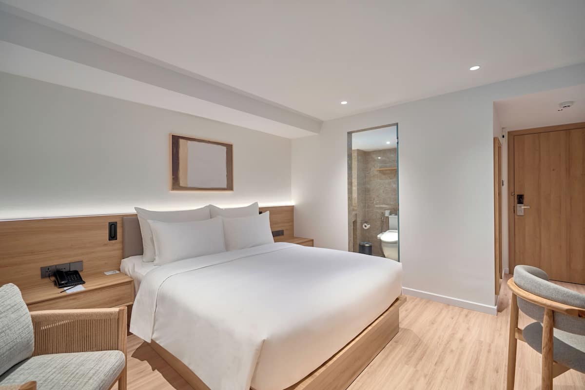 Deluxe Room, No Window | Premium bedding, free minibar, in-room safe, desk