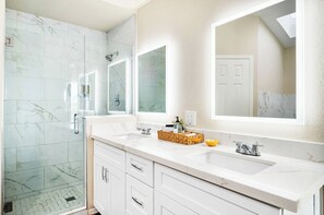 Hair dryer, towels, soap, shampoo