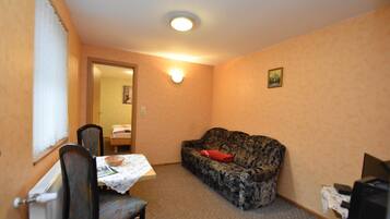Classic Apartment, 1 Bedroom | Living room | DVD player