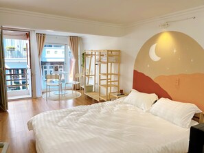 1 bedroom, desk, iron/ironing board, travel crib