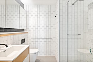 Shower, hair dryer, towels, shampoo