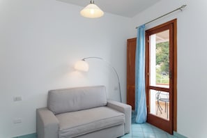 Basic Room, Balcony, Sea View | Minibar, in-room safe, desk, blackout drapes