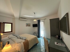 Basic Room, Balcony, Sea View | Minibar, in-room safe, desk, blackout drapes