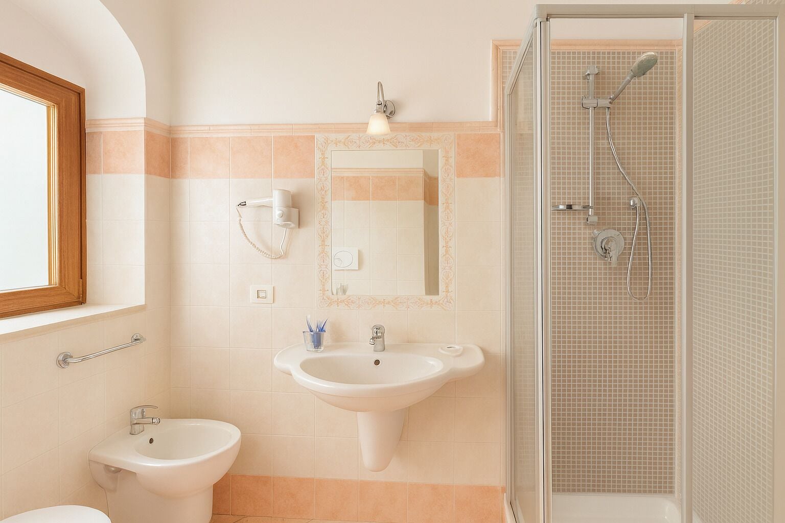 Une salle de bain avec un lavabo, un miroir et une douche.