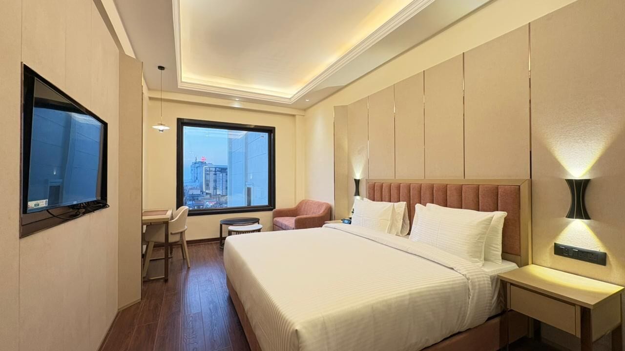 尊荣双人房, 阳台, 花园景观 | 办公桌、熨斗/熨板、免费 WiFi