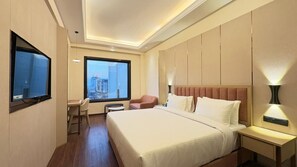 Kahden hengen premium-huone, parveke, näköala puutarhaan | Työpöytä, silitysrauta/-lauta, ilmainen Wi-Fi