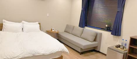 Family Quadruple Room | Living area