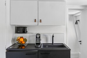 Microwave, stovetop, coffee/tea maker, electric kettle