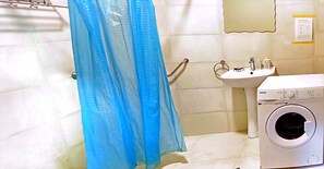 Hair dryer, towels, soap, toilet paper
