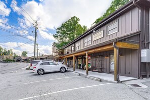 A street view with a building labeled "The Specified Outfitters." - Walk to Shops, Eats & Trails: Blowing Rock Escape! (Blowing Rock)