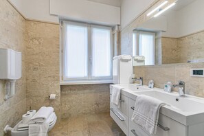 Family Apartment, Multiple Bedrooms (Residenza Albachiara) | Bathroom | Shower, hair dryer, bidet, towels - Residenza Albachiara (Riva del Garda)