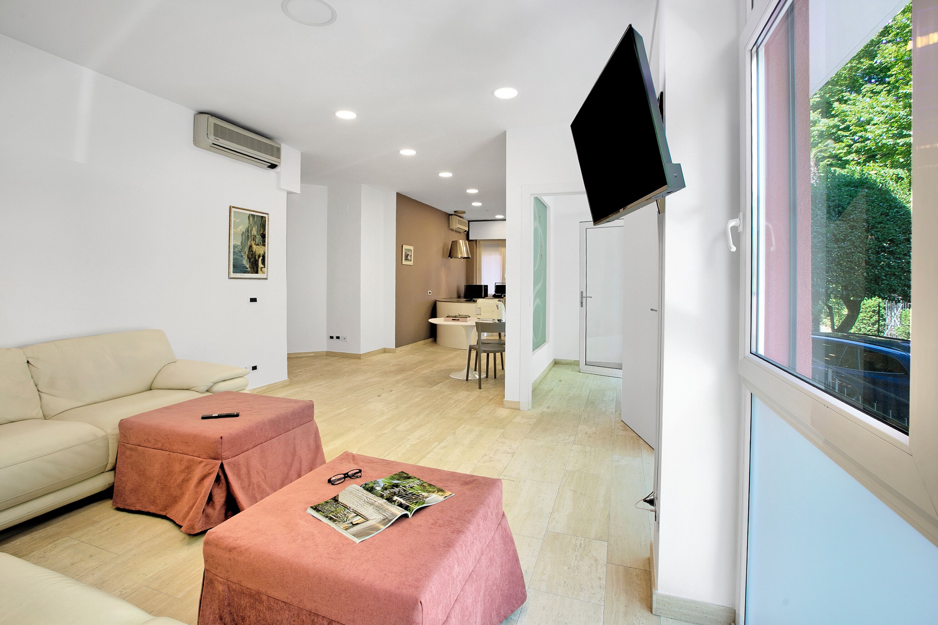 Family Apartment, Multiple Bedrooms (Residenza Albachiara) | Living area | 21-inch flat-screen TV with cable channels