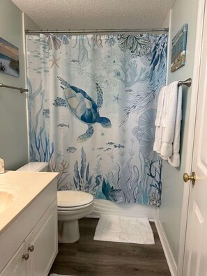 Shower, hair dryer, towels