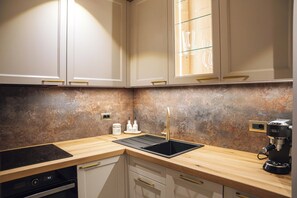 Deluxe Apartment, 2 Bedrooms, Mobility Accessible | Private kitchen | Full-size fridge, oven, stovetop, dishwasher