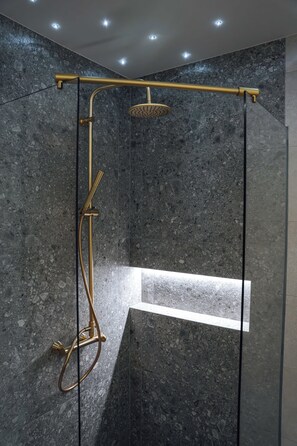 Deluxe Apartment, 1 Queen Bed, Balcony | Bathroom | Shower, hair dryer, bathrobes, slippers