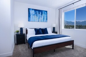 1 bedroom, desk, iron/ironing board, travel crib