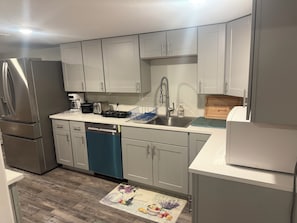 Fridge, microwave, dishwasher, coffee/tea maker