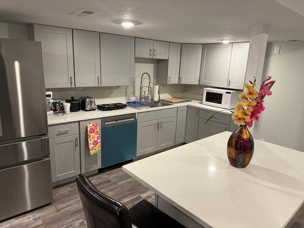 Fridge, microwave, dishwasher, coffee/tea maker