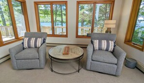 Signature House, 5 Bedrooms, Patio, Lake View | Living area | 50-inch Smart TV with digital channels, fireplace, foosball