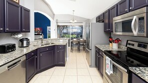 Fridge, microwave, oven, stovetop - 5BRDisney Villa w/ Pool,Game Room & Resort Access (Kisimmee)