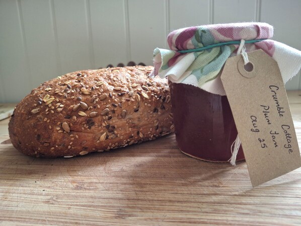 A loaf of seeded bread and a jar of preserves on a wooden surface. - Country cottage.
Perfect quiet retreat, away from the hustle and bustle of life. (Motcombe)
