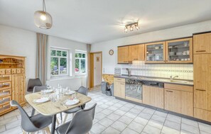 Fridge, stovetop, dishwasher, coffee/tea maker
