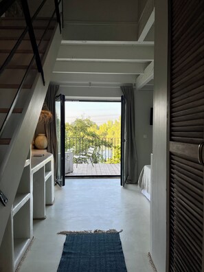 Habitació quàdruple familiar, vistes al riu | Cortines opaques i habitacions insonoritzades