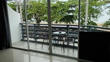 Grand Double Room, Beach View | In-room safe, iron/ironing board, cots/infant beds, rollaway beds