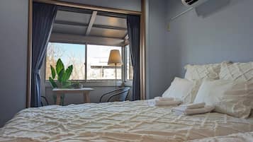 Basic Triple Room, Non Smoking, City View | Desk, laptop workspace, blackout curtains, iron/ironing board