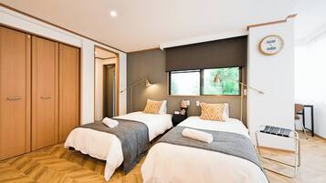 Desk, laptop workspace, blackout curtains, iron/ironing board