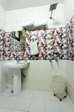 Shower, free toiletries, towels, soap