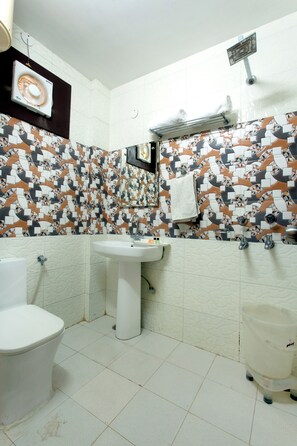 Shower, free toiletries, towels, soap