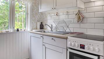 Réfrigérateur, plaque de cuisson, cafetiÚre/bouilloire