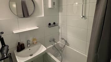 Hair dryer, towels, soap, toilet paper