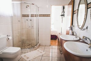 Shower, jetted tub, towels, soap