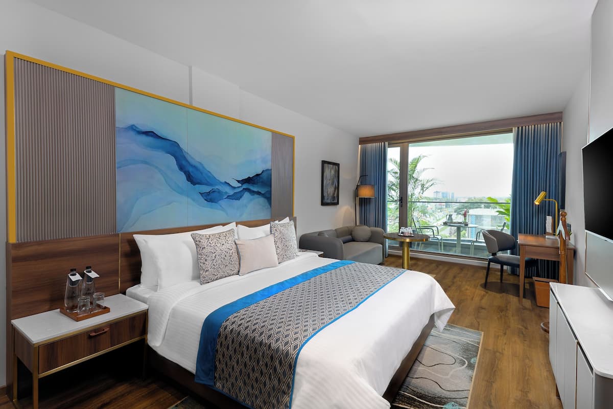 Club Double Room, Balcony, Garden View | In-room safe, desk, laptop workspace, iron/ironing board