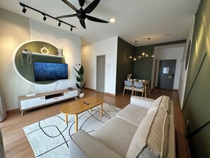 Apartamento, 2 quartos | Área de estar