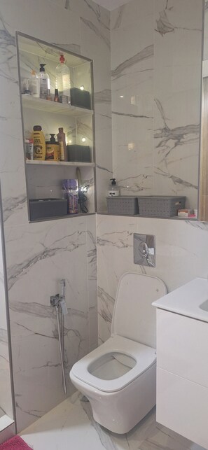 Hair dryer, towels, soap, toilet paper
