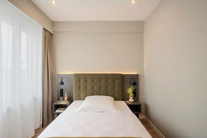 Comfort eenpersoonskamer | Een kluis op de kamer, een strijkplank/strijkijzer, gratis wifi