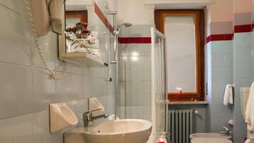 Free toiletries, hair dryer, slippers, towels