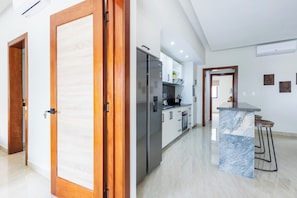 Luxury Apartment, Pool View | Private kitchen